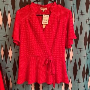 Red and white polka dot faux wrap top